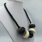 Statement Kette Schwarz Weiß große Elemente Kordel  moderner Design Schmuck
