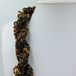 Geflochtene Perlenkette in Braun und Gold  auffällig elegant