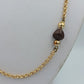Lange goldfarbene Kette mit braunen Perlen – Vintage Look