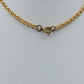 Lange goldfarbene Kette mit braunen Perlen – Vintage Look