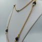 Lange goldfarbene Kette mit braunen Perlen – Vintage Look