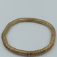 Elastisches Armband in Goldoptik – geflochtenes Design