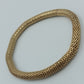 Elastisches Armband in Goldoptik – geflochtenes Design