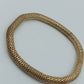 Elastisches Armband in Goldoptik – geflochtenes Design