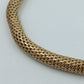 Elastisches Armband in Goldoptik – geflochtenes Design