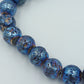 Elastisches Armband mit blauen Lavastein-Perlen – schimmernd
