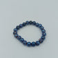 Elastisches Armband mit blauen Lavastein-Perlen – schimmernd