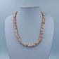 Muschelkette / Korallenkette in zarten Rosé-Tönen – Vintage Stil