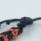 Geflochtenes Armband schwarz orange – verstellbar, lässiger Stil
