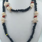 Boho Kette mit Muscheln und schwarzen Scheibenperlen