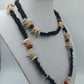 Boho Kette mit Muscheln und schwarzen Scheibenperlen