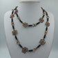 Lange Boho Kette mit Drahtblumen und Kupfer-Optik Handarbeitsstil