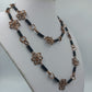 Lange Boho Kette mit Drahtblumen und Kupfer-Optik Handarbeitsstil