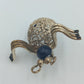 Vintage Brosche – filigranes Design mit blauer Perle – ca. 3 cm