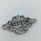 Vintage Brosche im Barockstil mit Strass Cabochons – silberfarben