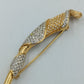 Elegante Vintage Brosche in Goldoptik mit Strass – geschwungenes Design