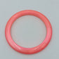 Auffälliger Statement Armreif in leuchtendem Neon-Pink