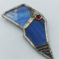 Vintage Designer Brosche – abstrakt, blaues Glas  roter Stein
