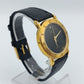 Vintage MC Quartz Armbanduhr Schwarz Gold