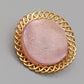 Elegante Vintage Brosche in Goldoptik Runder Rosa Stein