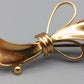 Elegante Vintage Brosche in Goldoptik Schleifen Design