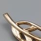Elegante Goldene Brosche in Blattform Vintage Design