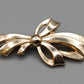 Elegante Schleifen Brosche in Goldoptik Vintage