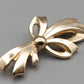 Elegante Schleifen Brosche in Goldoptik Vintage