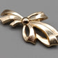 Elegante Schleifen Brosche in Goldoptik Vintage