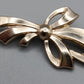 Elegante Schleifen Brosche in Goldoptik Vintage