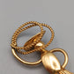 Gaucho Brosche in Goldoptik Vintage Accessoire