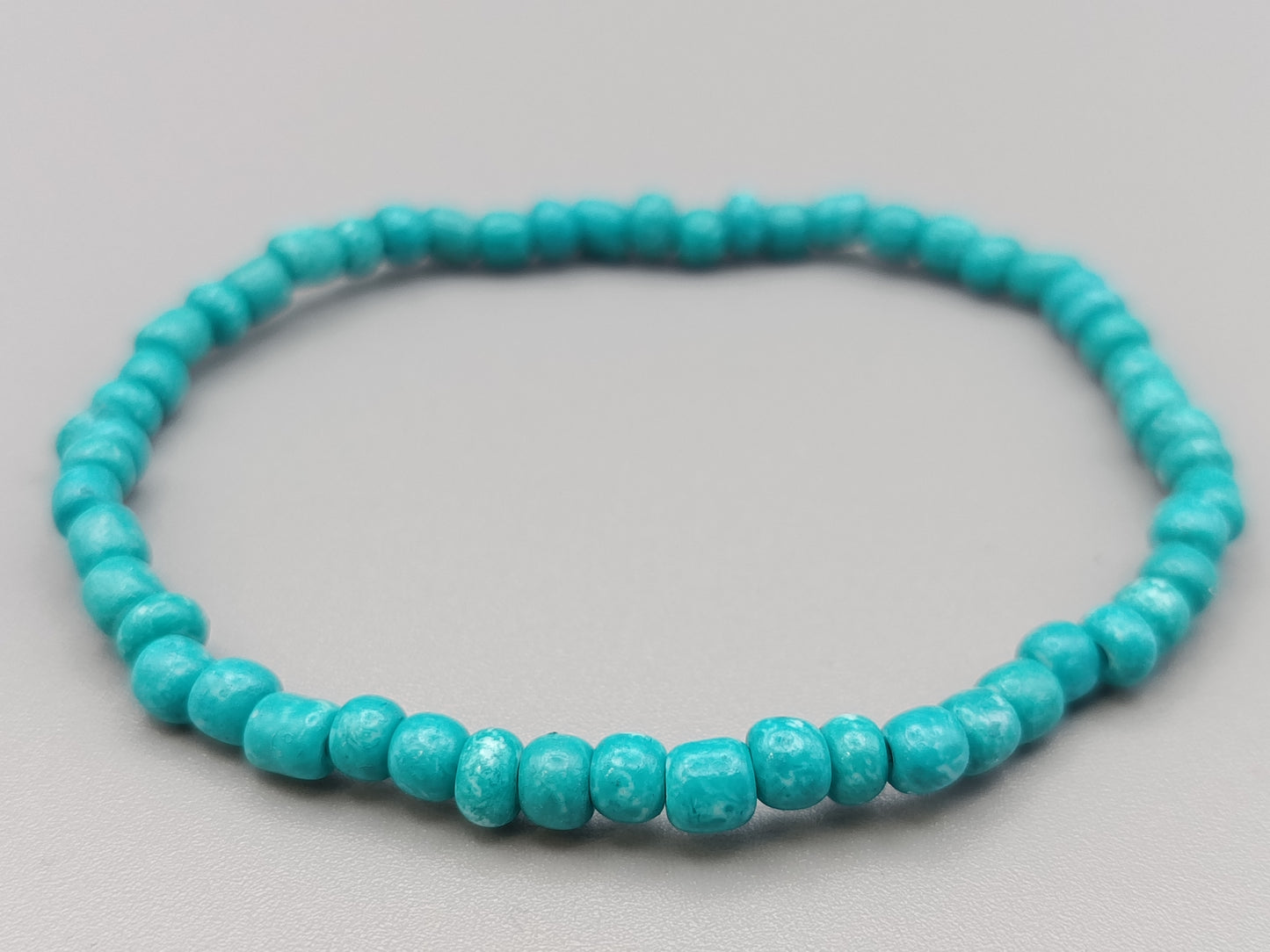 Schmuckes Perlen Armband in Türkis Elastisch