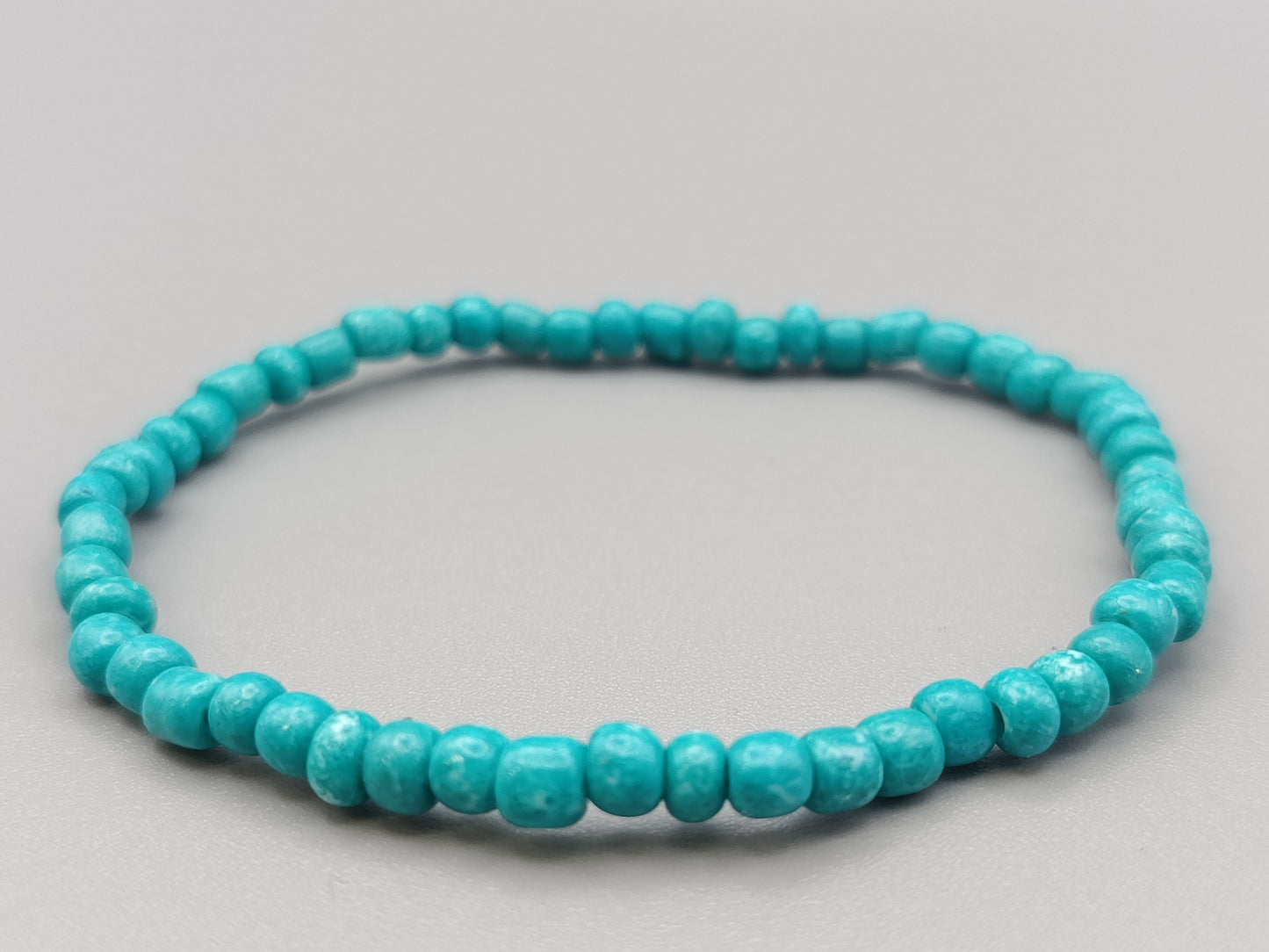 Schmuckes Perlen Armband in Türkis Elastisch