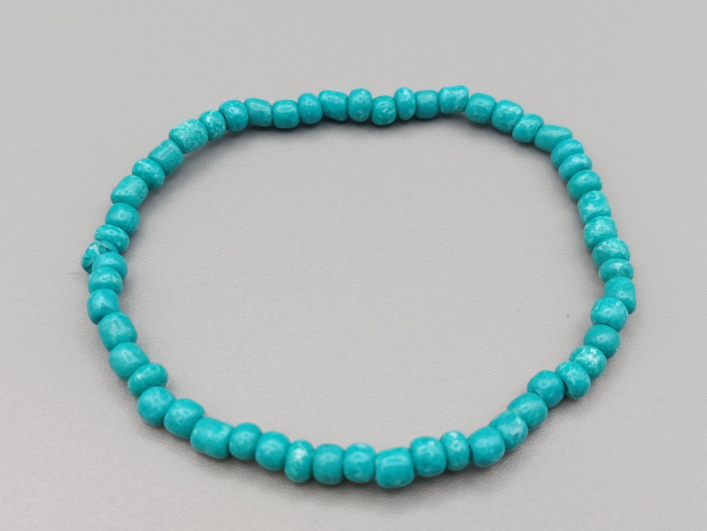 Schmuckes Perlen Armband in Türkis Elastisch