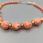 Elegante lachsfarbene Perlenkette Vintage Stil