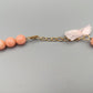 Elegante lachsfarbene Perlenkette Vintage Stil