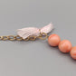Elegante lachsfarbene Perlenkette Vintage Stil