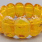 Markantes Bernstein Armband Design in Honiggelb