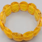Markantes Bernstein Armband Design in Honiggelb