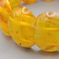 Markantes Bernstein Armband Design in Honiggelb
