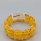Markantes Bernstein Armband Design in Honiggelb