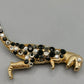 Modische T-Rex Dinosaurier Brosche in Goldoptik