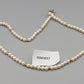 Klassische Perlen Kette mit Goldakzenten