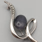 Elegante Vintage Brosche in Silber Optik