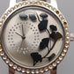 Moderne Damen Uhr mit Strasslünette und floralem Zifferblatt