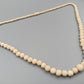Klassische Elegante Perlenkette im Verlauf