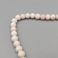 Elegante weiße Perlenkette Halskette mit zartem Roséton
