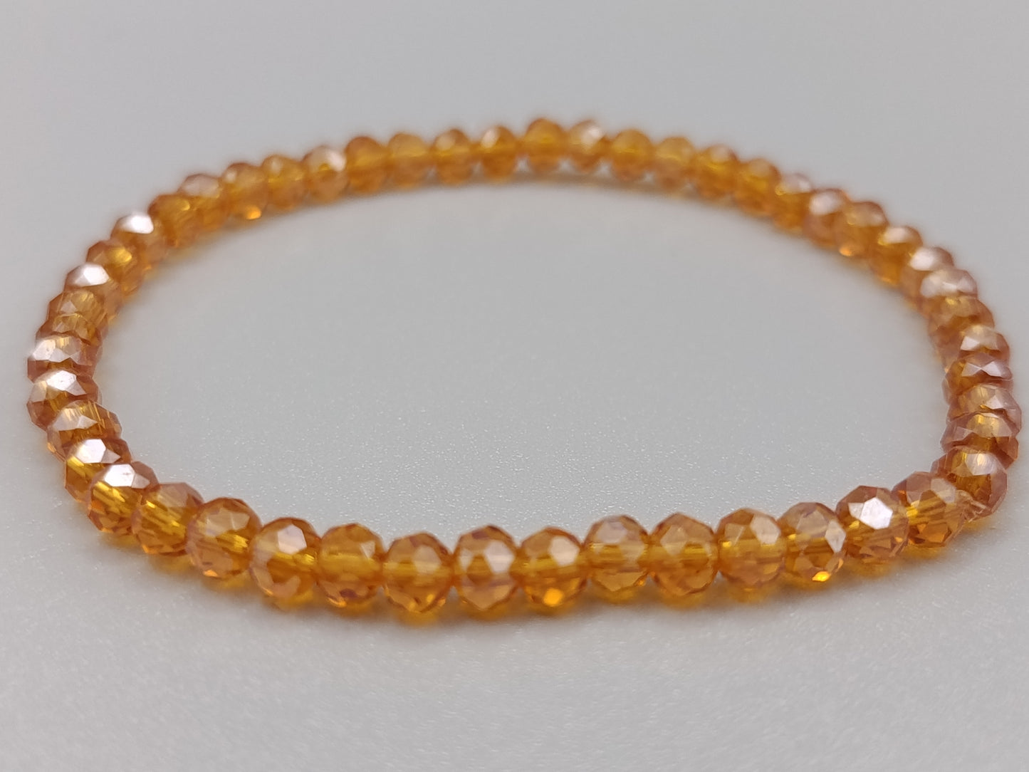 Elegantes Damen Arm Band in Bernstein-Optik