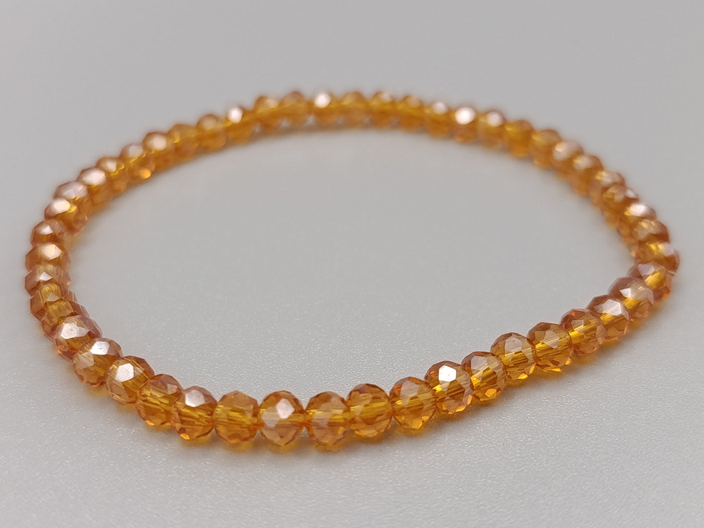 Elegantes Damen Arm Band in Bernstein-Optik