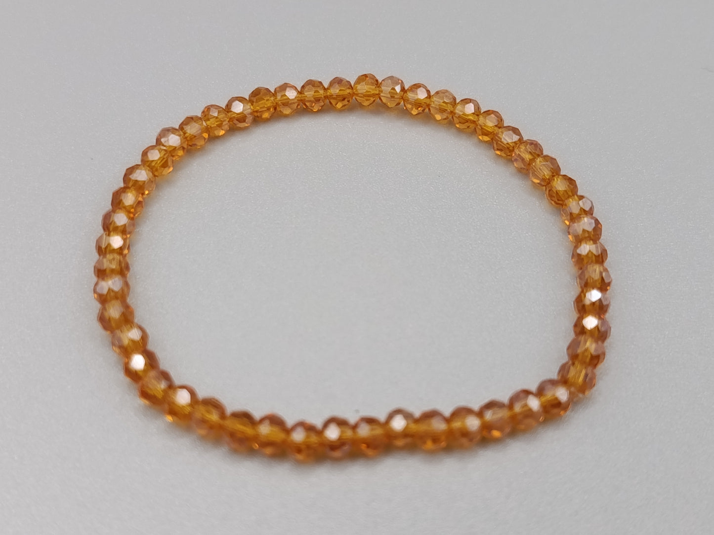 Elegantes Damen Arm Band in Bernstein-Optik